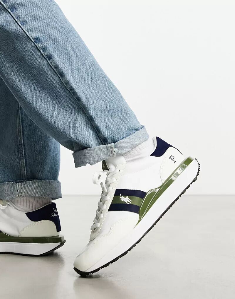 Кроссовки Polo Ralph Lauren x ASOS Exclusive Collab Train '89 кремово-белого, зеленого и темно-синего цветов из кожи и замши с логотипом игрока в поло
Кроссовки Polo Ralph Lauren x ASOS Exclusive Collab Train '89 кремово-белого, зеленого и темно-синего цветов из кожи и замши с логотипом игрока в поло
