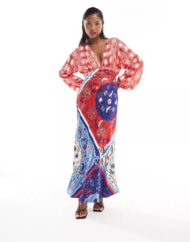 Красное платье макси Never Fully Dressed Petite с контрастными принтами в виде банданы
Красное платье макси Never Fully Dressed Petite с контрастными принтами в виде банданы