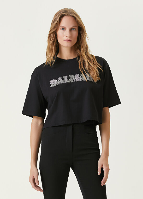 Черная укороченная футболка с круглым вырезом и каменным логотипом Balmain, Черный
Черная укороченная футболка с круглым вырезом и каменным логотипом Balmain, Черный