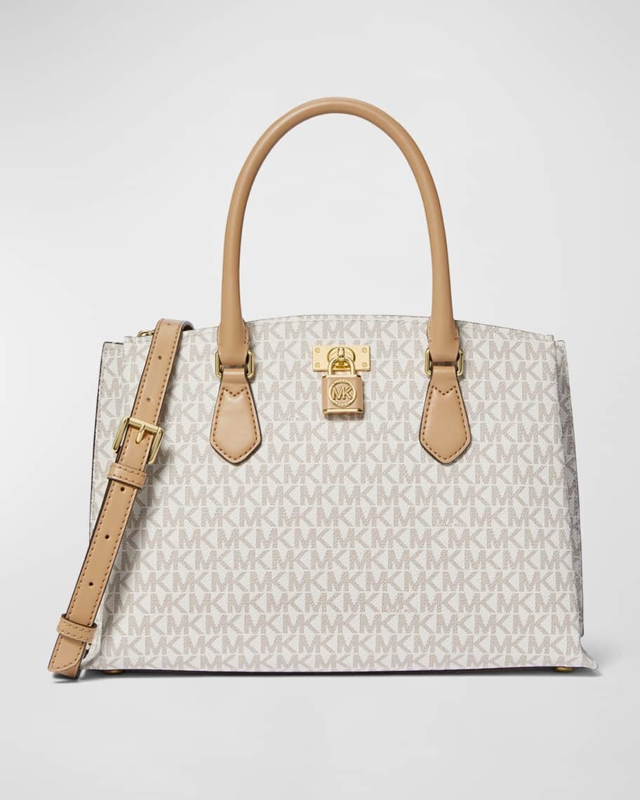 Рубиновая кожаная сумка-сэтчел среднего размера с монограммой MICHAEL Michael Kors
Рубиновая кожаная сумка-сэтчел среднего размера с монограммой MICHAEL Michael Kors