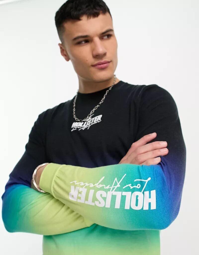 Топ Hollister с градиентом черного/разноцветного цвета с длинными рукавами и логотипом на груди и рукавах
Топ Hollister с градиентом черного/разноцветного цвета с длинными рукавами и логотипом на груди и рукавах