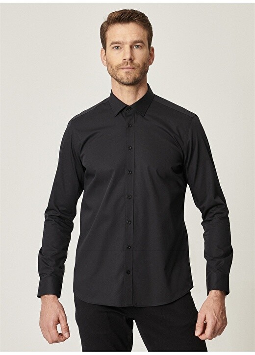 Slim Fit однотонная мужская классическая рубашка черного цвета Altınyıldız Classic
Slim Fit однотонная мужская классическая рубашка черного цвета Altınyıldız Classic