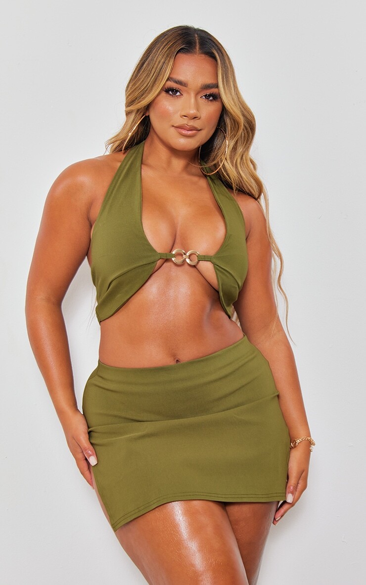 PrettyLittleThing Укороченный топ цвета хаки из эластичной ткани с воротником халтер и цепочкой
PrettyLittleThing Укороченный топ цвета хаки из эластичной ткани с воротником халтер и цепочкой