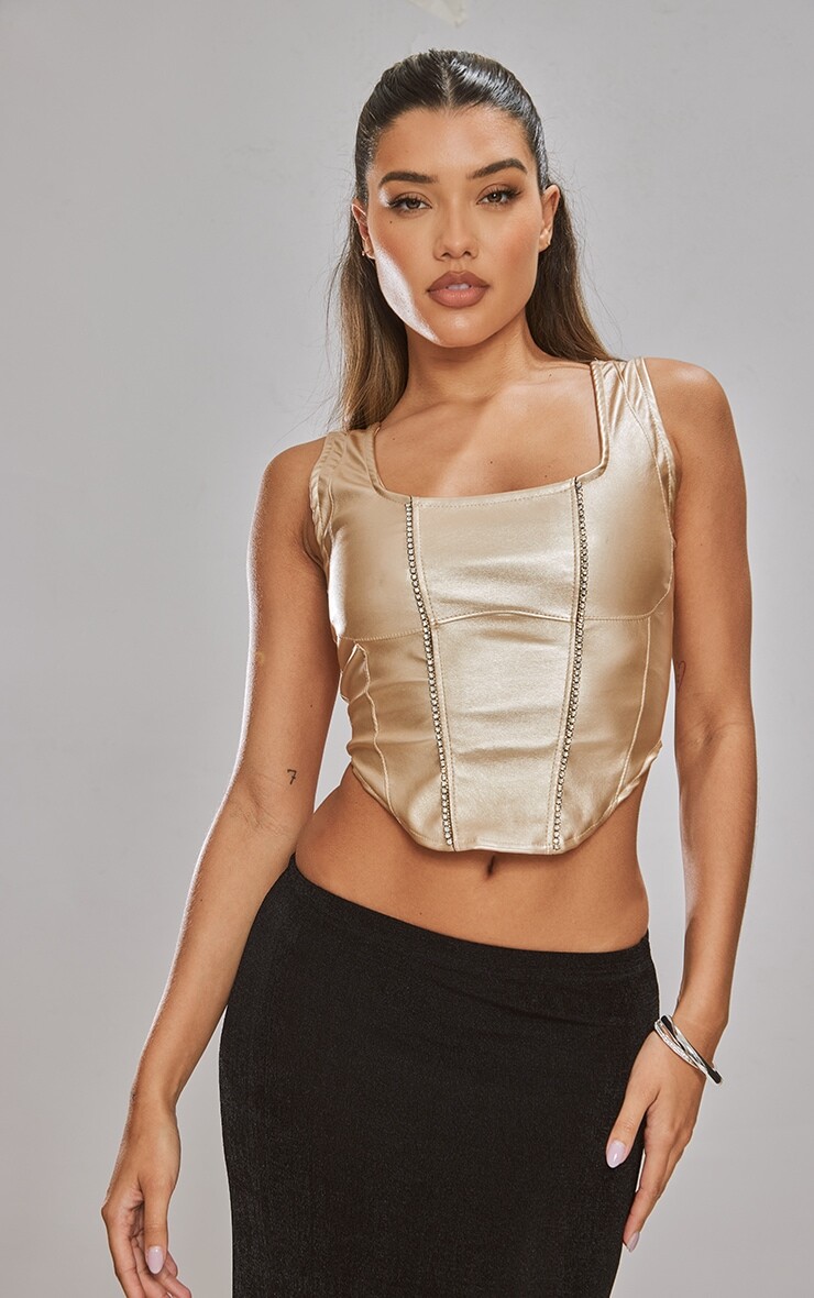 PrettyLittleThing Золотой корсет из искусственной кожи под грудью с отделкой стразами и глубоким подолом
PrettyLittleThing Золотой корсет из искусственной кожи под грудью с отделкой стразами и глубоким подолом