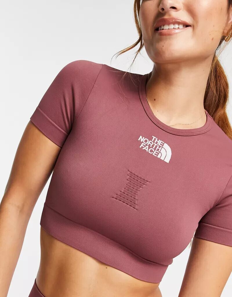 Розовая укороченная бесшовная футболка The North Face для тренировок, эксклюзивно для ASOS
Розовая укороченная бесшовная футболка The North Face для тренировок, эксклюзивно для ASOS