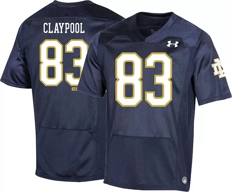 Молодежная футболка Under Armour Notre Dame Fighting Irish Chase Claypool № 83, реплика военно-морского флота, футбольная майка
Молодежная футболка Under Armour Notre Dame Fighting Irish Chase Claypool № 83, реплика военно-морского флота, футбольная майка