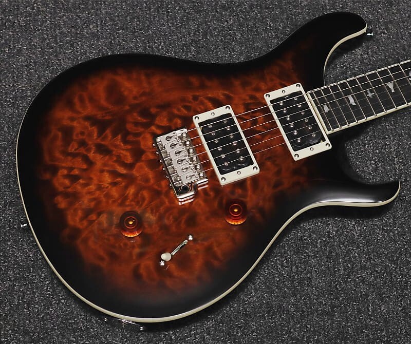 Электрогитара PRS SE Custom 24 Electric Guitar Quilted Black Gold Sunburst - W/Setup & Bag
Электрогитара PRS SE Custom 24 Electric Guitar Quilted Black Gold Sunburst - W/Setup & Bag