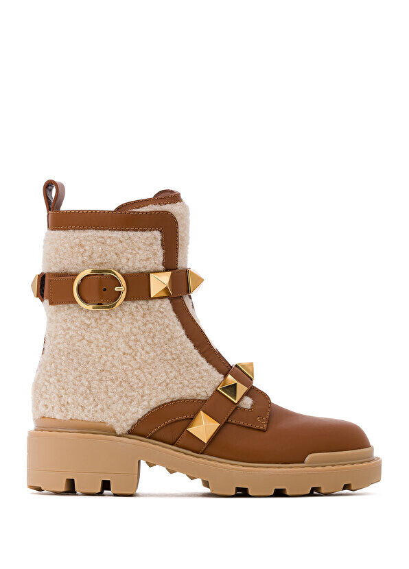 Желто-коричневые женские кожаные ботинки rockstud из овчины Valentino Garavani
Желто-коричневые женские кожаные ботинки rockstud из овчины Valentino Garavani