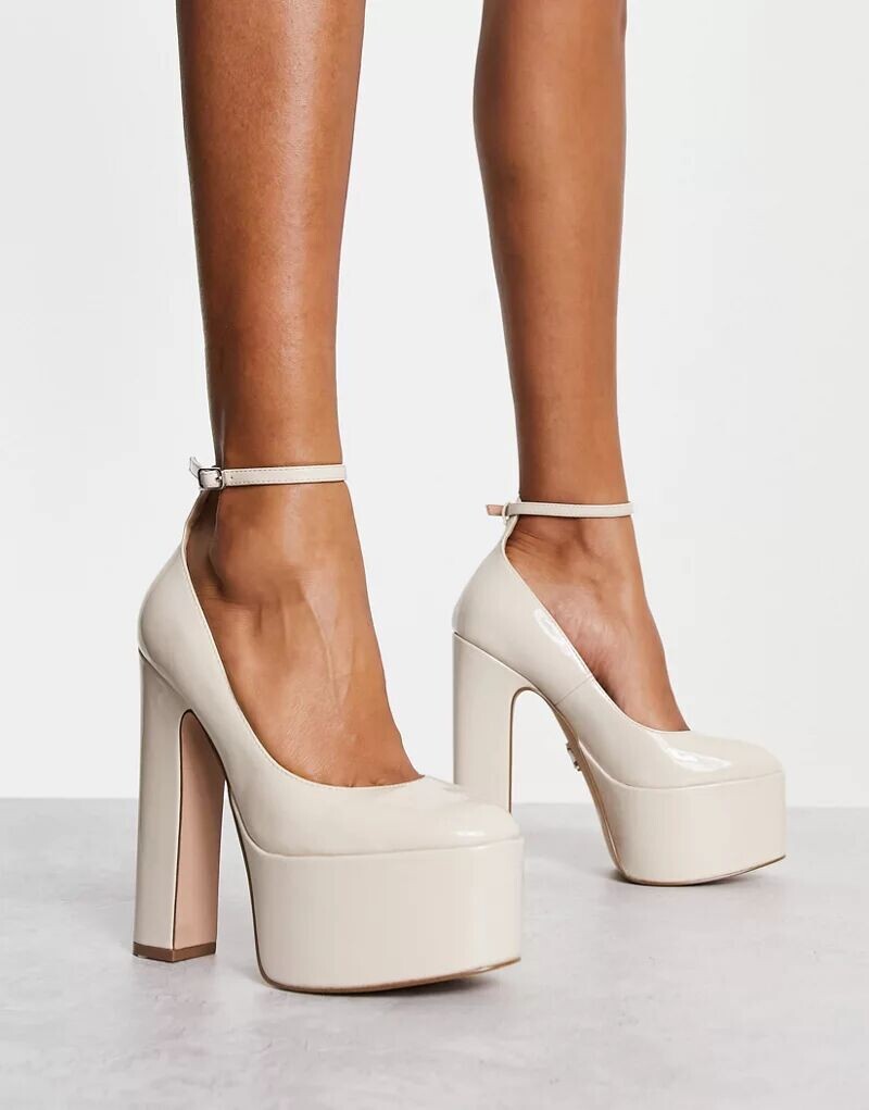 Steve Madden Туфли Skyrise на каблуке костяно-белого цвета с лакированной отделкой и подошвой на платформе
Steve Madden Туфли Skyrise на каблуке костяно-белого цвета с лакированной отделкой и подошвой на платформе
