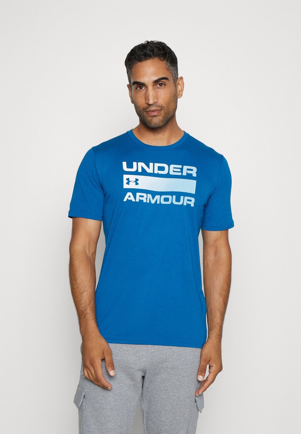 спортивная футболка СЛОВО TEAM ISSUE Under Armour, университетский синий/белый/метель
спортивная футболка СЛОВО TEAM ISSUE Under Armour, университетский синий/белый/метель