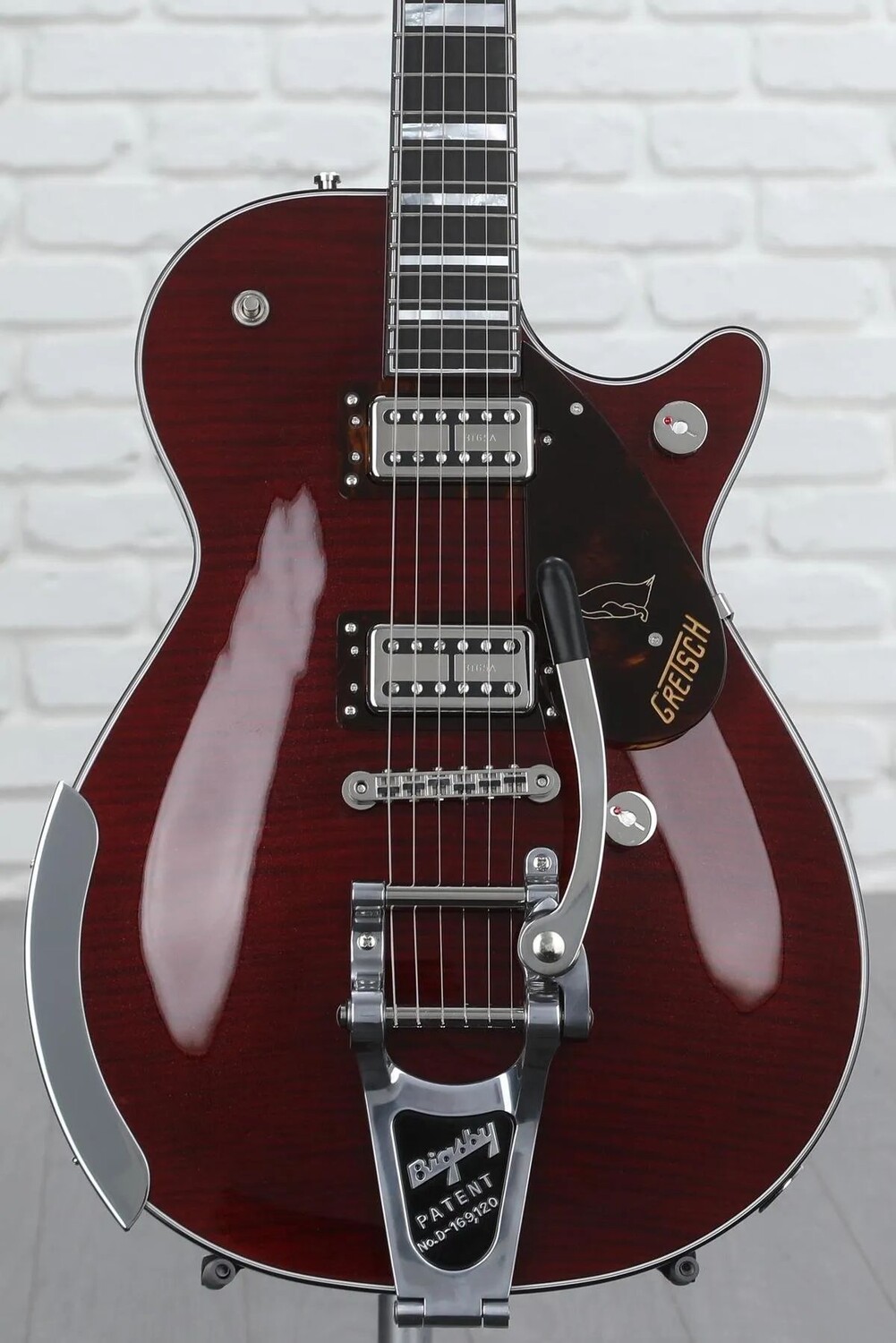 Gretsch G6134TFM-NH Nigel Hendroff Signature Penguin — темно-вишневый металлик пламя
Gretsch G6134TFM-NH Nigel Hendroff Signature Penguin — темно-вишневый металлик пламя