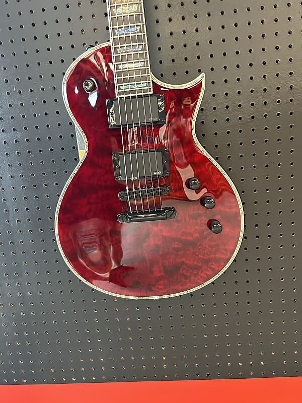 Электрогитара ESP LTD EC-1000 QM with Pau Ferro Fretboard 2018 - Present - See Thru Black Cherry
Электрогитара ESP LTD EC-1000 QM with Pau Ferro Fretboard 2018 - Present - See Thru Black Cherry