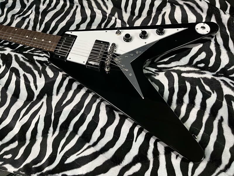 Электрогитара 2023 Epiphone Flying V Ebony 6.85lbs- Authorized Dealer- In Stock! G01669
Электрогитара 2023 Epiphone Flying V Ebony 6.85lbs- Authorized Dealer- In Stock! G01669