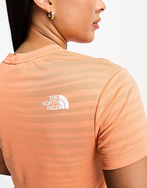 Оранжевая футболка из технического материала The North Face Training Mountain Athletic FlashDry
Оранжевая футболка из технического материала The North Face Training Mountain Athletic FlashDry