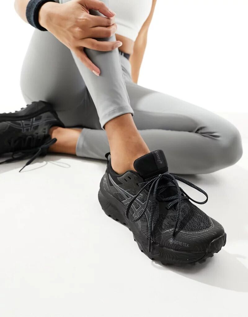 Asics – Gel-Trabuco 11 GTX – кроссовки для трейлраннинга черного цвета с толстой подошвой
Asics – Gel-Trabuco 11 GTX – кроссовки для трейлраннинга черного цвета с толстой подошвой