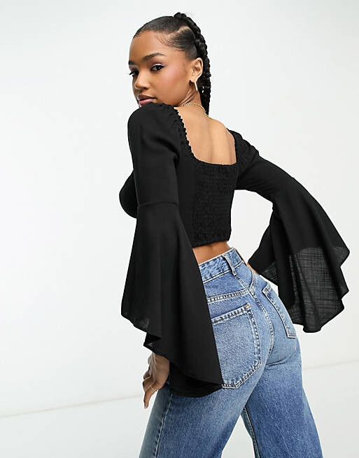 Черный льняной топ с расклешенными рукавами и завязкой спереди Miss Selfridge - BLACK
Черный льняной топ с расклешенными рукавами и завязкой спереди Miss Selfridge - BLACK