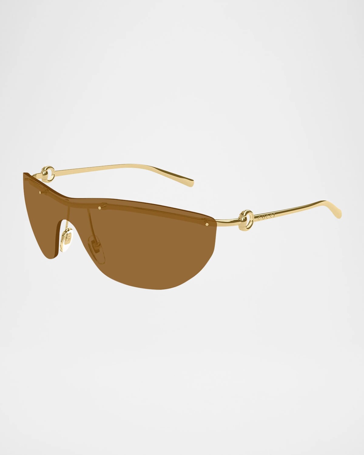 Солнцезащитные очки без оправы с металлической защитой Gucci, цвет Shiny Endura Gold
Солнцезащитные очки без оправы с металлической защитой Gucci, цвет Shiny Endura Gold