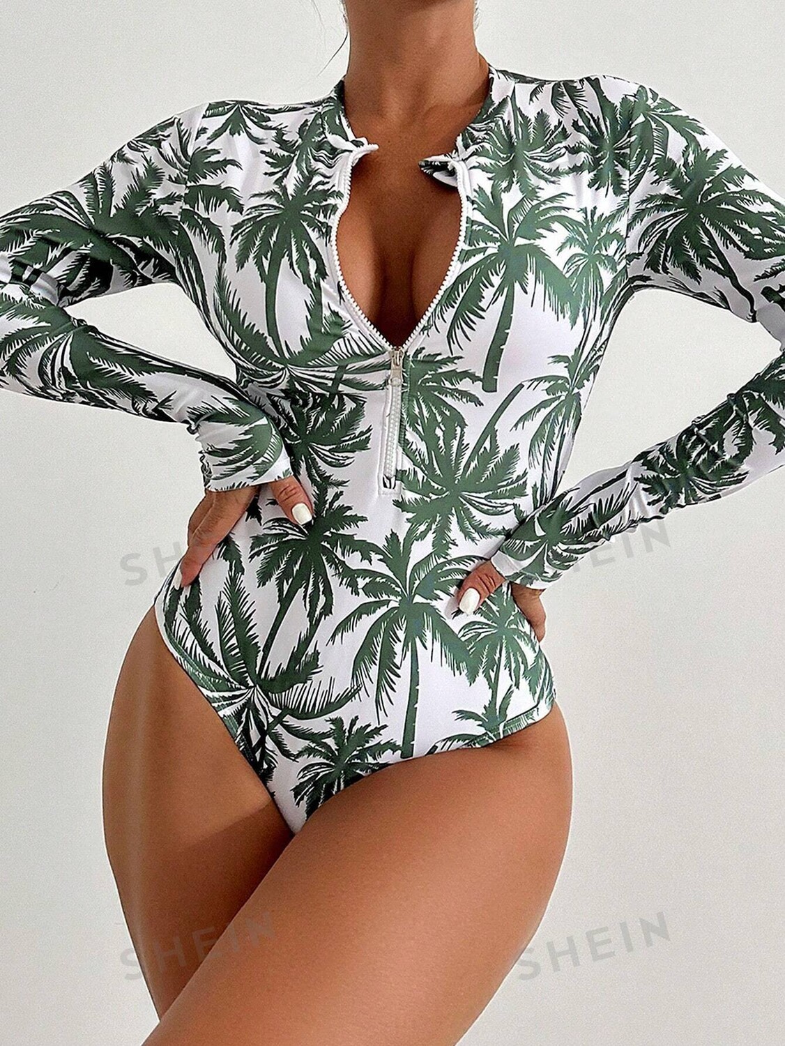 SHEIN Swim Vcay Женский цельный купальник с полумолнией спереди и длинными рукавами, зеленый
SHEIN Swim Vcay Женский цельный купальник с полумолнией спереди и длинными рукавами, зеленый