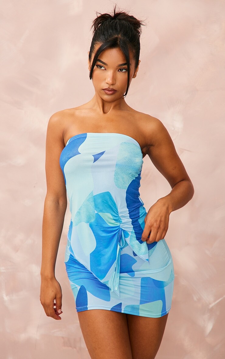 PrettyLittleThing Синее облегающее бандо асимметричного кроя со сборками и принтом
PrettyLittleThing Синее облегающее бандо асимметричного кроя со сборками и принтом