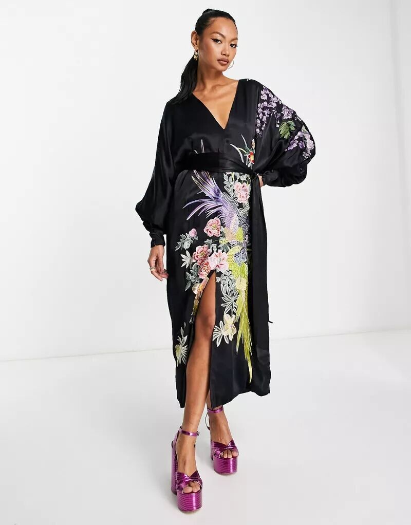 Черное платье миди ASOS с ярким цветочным принтом и принтом феникса, а также V-образным вырезом
Черное платье миди ASOS с ярким цветочным принтом и принтом феникса, а также V-образным вырезом