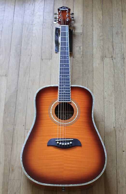 Акустическая гитара Oscar Schmidt - 3/4 Dreadnought Acoustic - Flame Yellow Sunburst
Акустическая гитара Oscar Schmidt - 3/4 Dreadnought Acoustic - Flame Yellow Sunburst