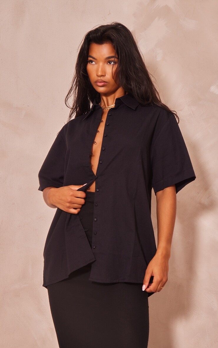 PrettyLittleThing Черная льняная рубашка большого размера с пуговицами и короткими рукавами с карманами
PrettyLittleThing Черная льняная рубашка большого размера с пуговицами и короткими рукавами с карманами