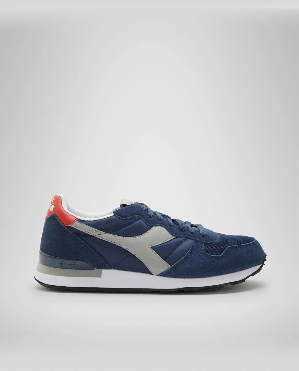 Кроссовки унисекс со шнуровкой и контрастной деталью на каблуке Diadora Sportswear, синий
Кроссовки унисекс со шнуровкой и контрастной деталью на каблуке Diadora Sportswear, синий