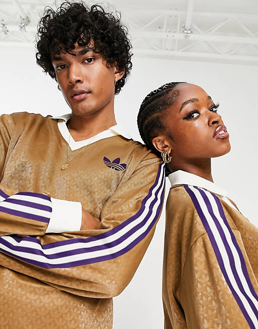 Коричневая футболка-поло унисекс с длинными рукавами и монограммой adidas Originals 'adicolor 70s, Коричневый
Коричневая футболка-поло унисекс с длинными рукавами и монограммой adidas Originals 'adicolor 70s, Коричневый