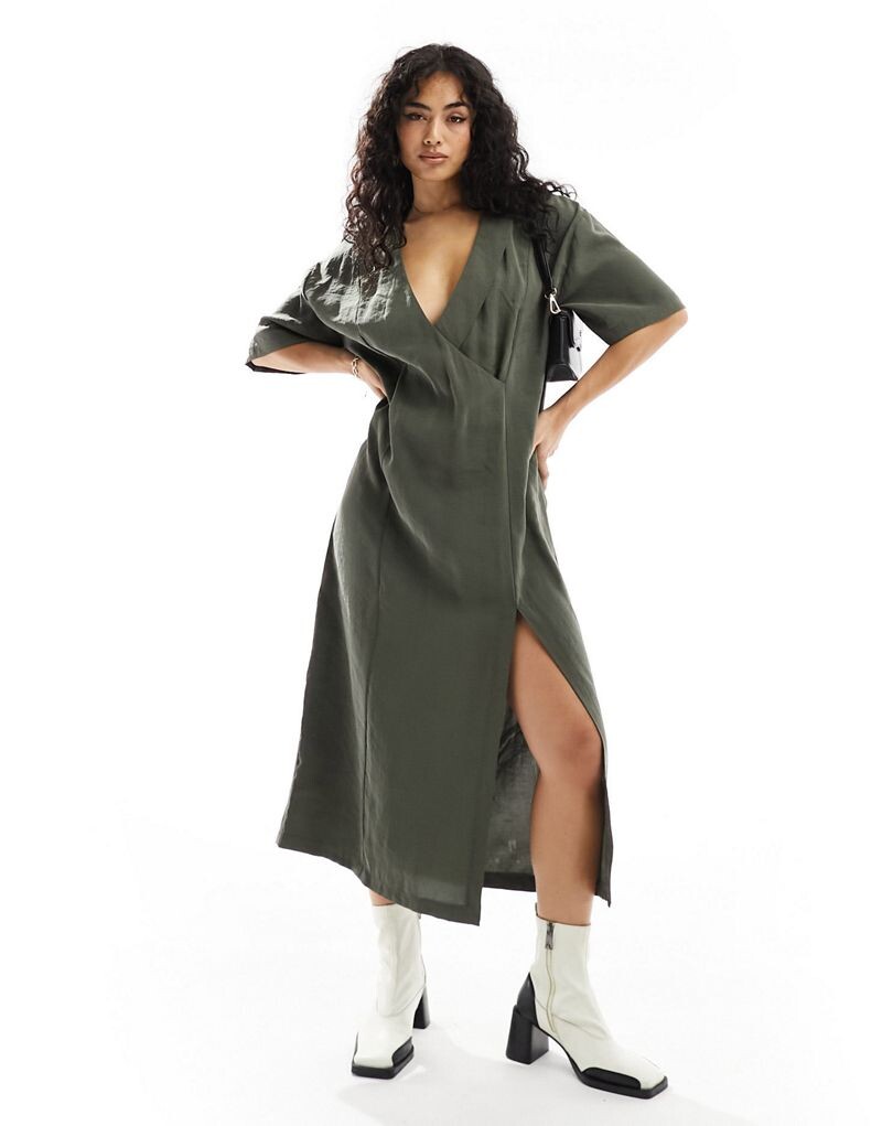 Платье миди свободного кроя с запахом и воротником-стойкой ASOS DESIGN темного цвета хаки
Платье миди свободного кроя с запахом и воротником-стойкой ASOS DESIGN темного цвета хаки