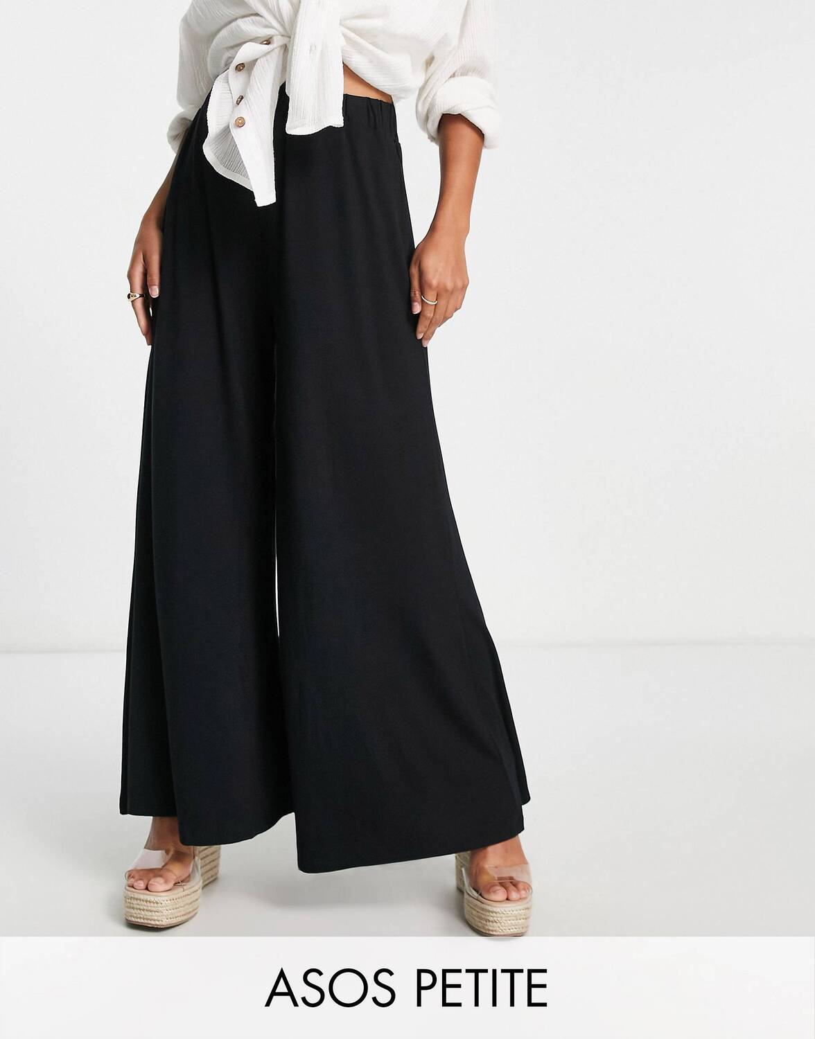 

Черные пляжные брюки палаццо из джерси ASOS DESIGN Petite