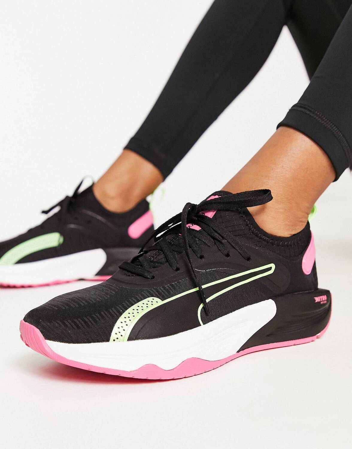 

Черные, розовые и зеленые кроссовки Puma Training PWR XX Nitro