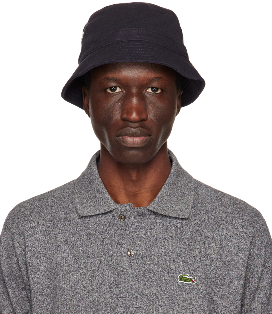 

Темно-синяя панама с нашивками Lacoste