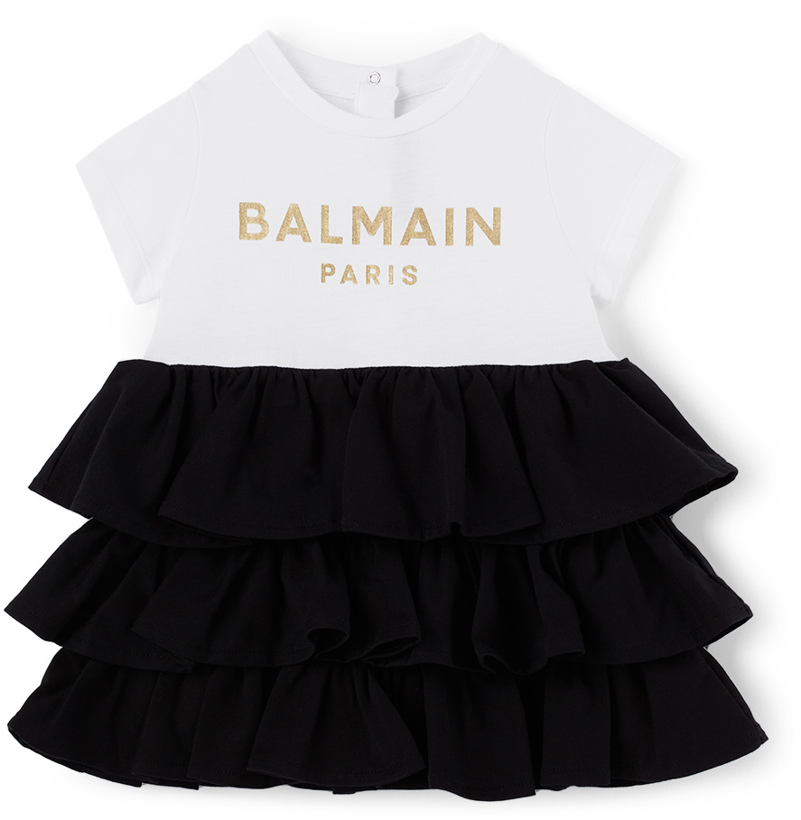 

Бело-черное платье-пачка с рюшами и логотипом Baby Baby Balmain
