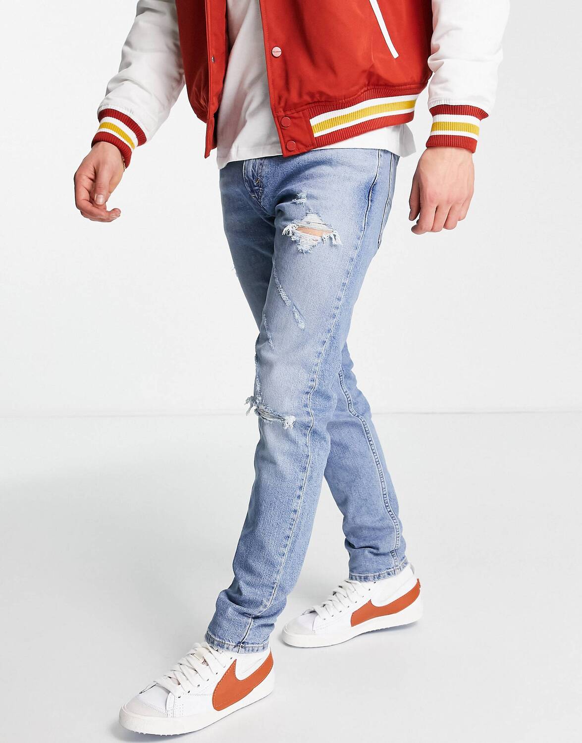 

Голубые зауженные зауженные джинсы Levi's 512 с прорехами