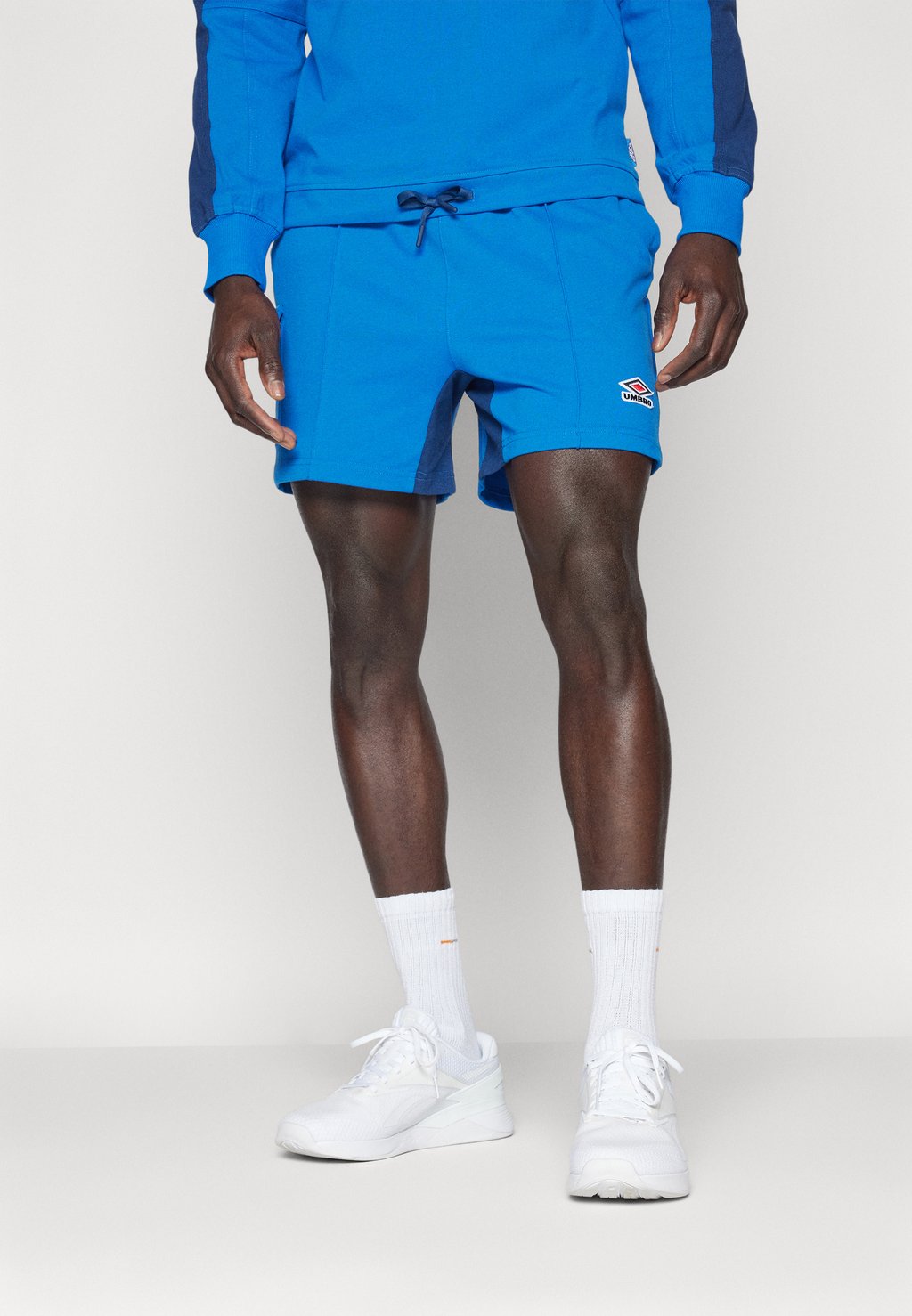 Спортивные шорты PANELLED SHORT Umbro, синий