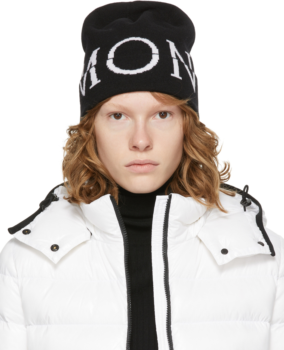 

Черно-белая шерстяная шапка с логотипом Moncler