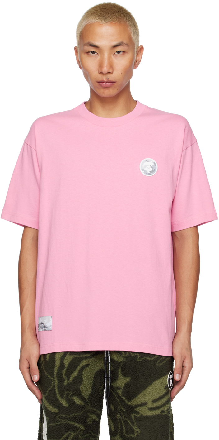 

Розовая футболка с нашивками AAPE by A Bathing Ape