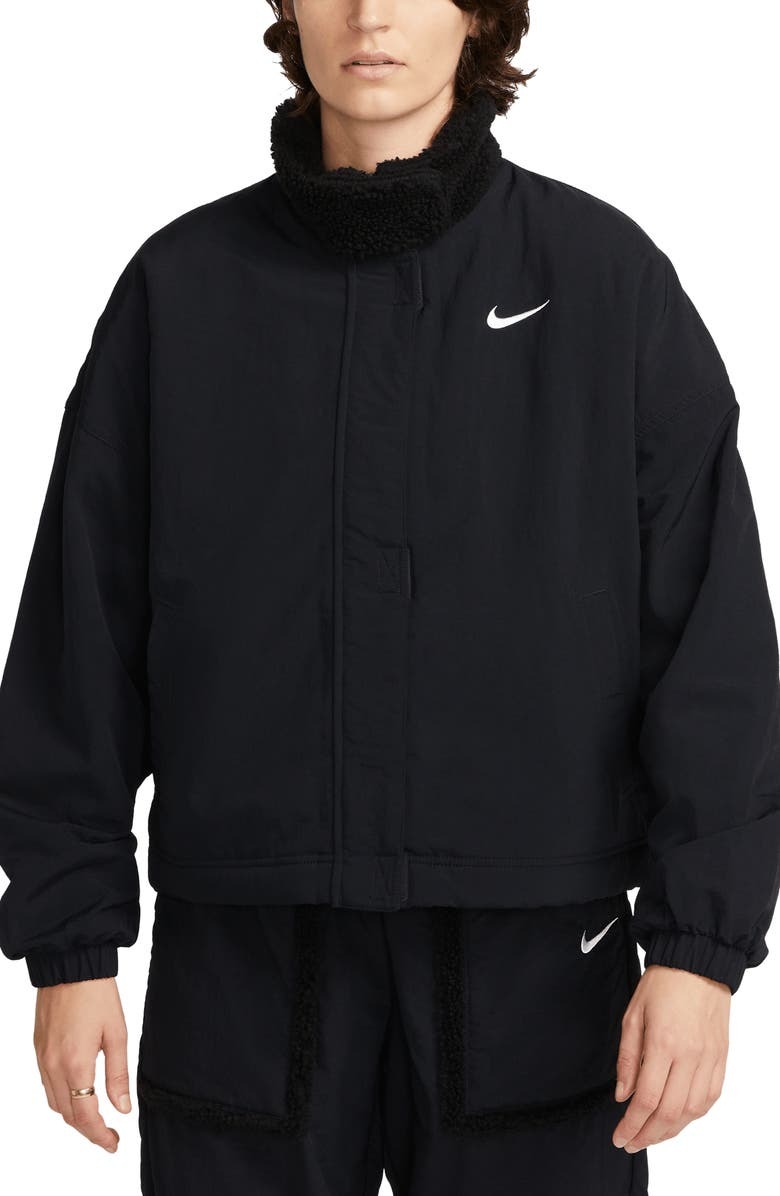 

Спортивная куртка с подкладкой из искусственного меха NIKE, черный/белый