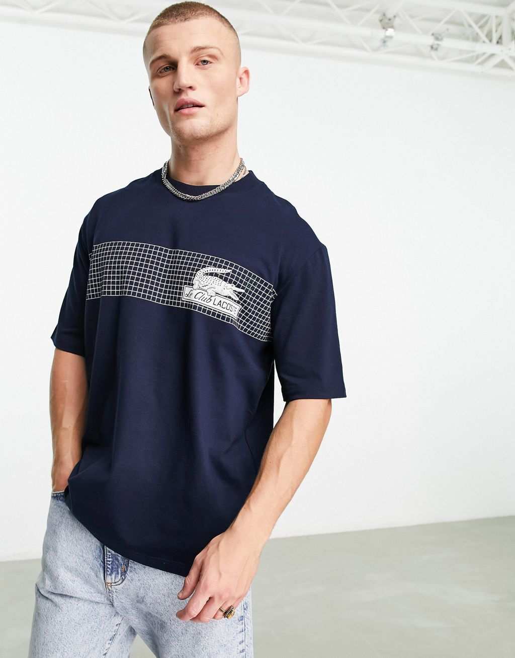 

Темно-синяя футболка свободного кроя Lacoste с графикой спереди, Синий