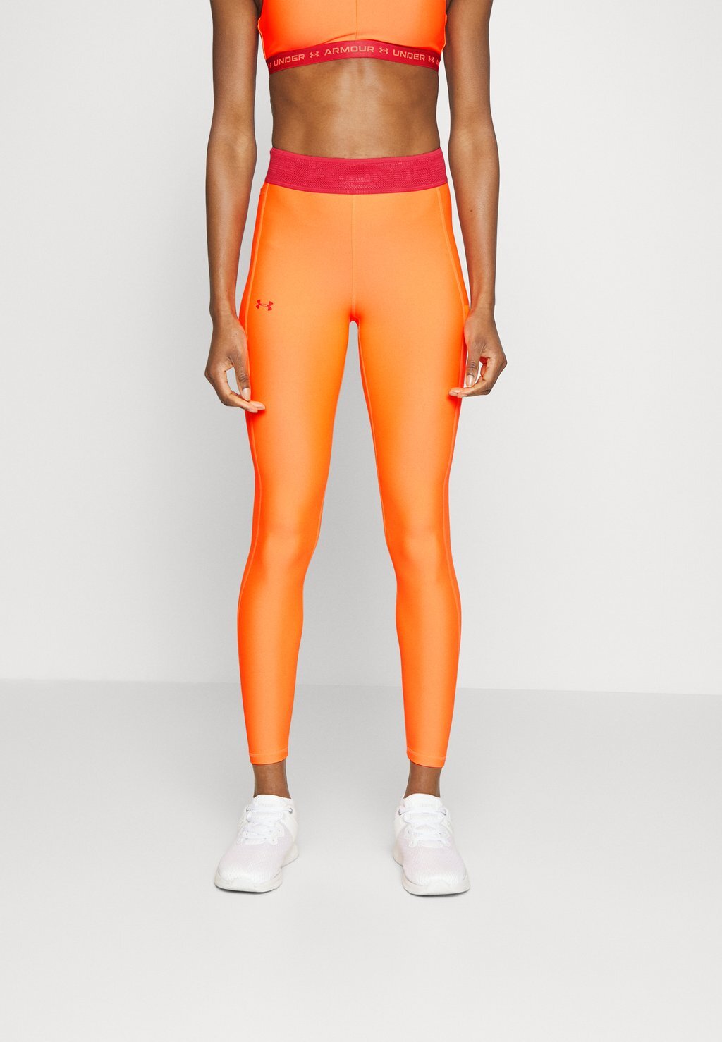 

Тайтсы Under Armour, Оранжевый