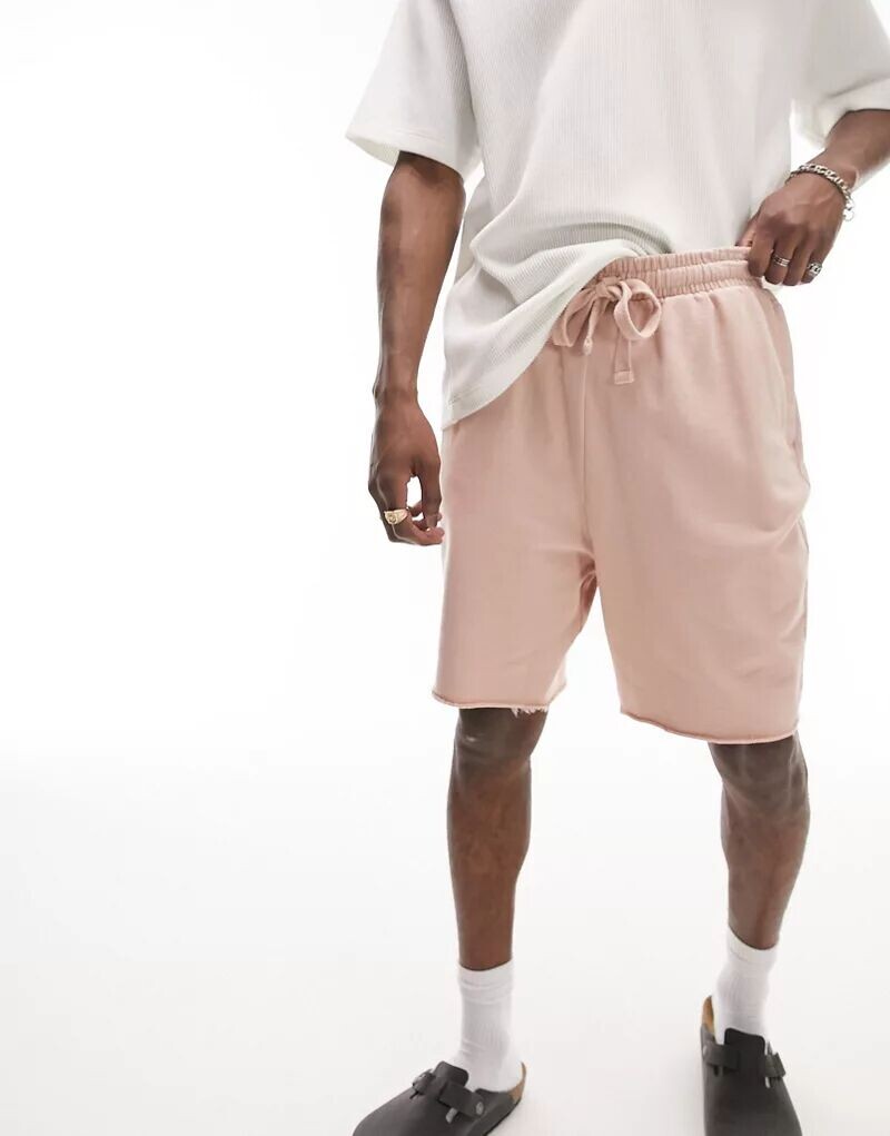 

Розовые шорты оверсайз с необработанным краем Topman
