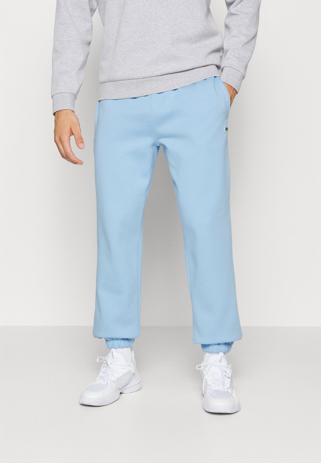 

Спортивные брюки Lacoste