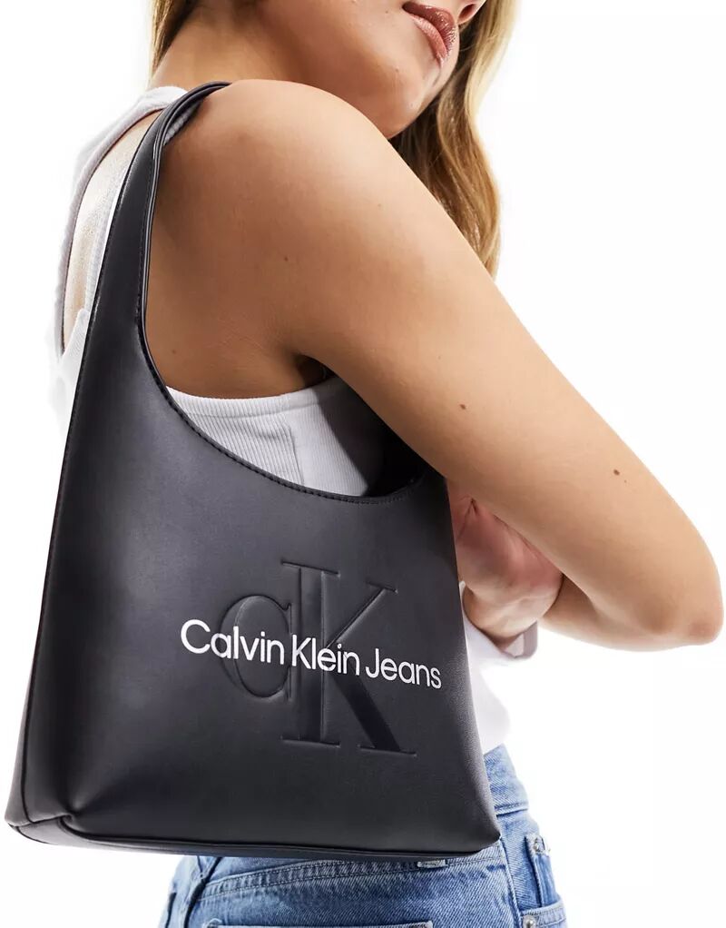 Черная изогнутая сумка через плечо Calvin Klein кроссовки guess runner varese logo schwarz