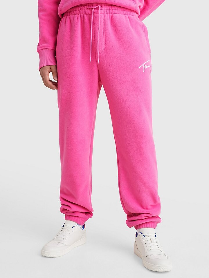 

Яркие брюки из полярного флиса Tommy Jeans
