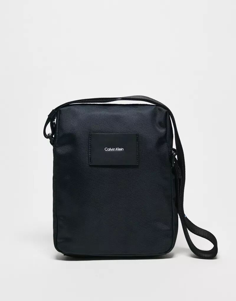 Черная репортерская сумка Calvin Klein