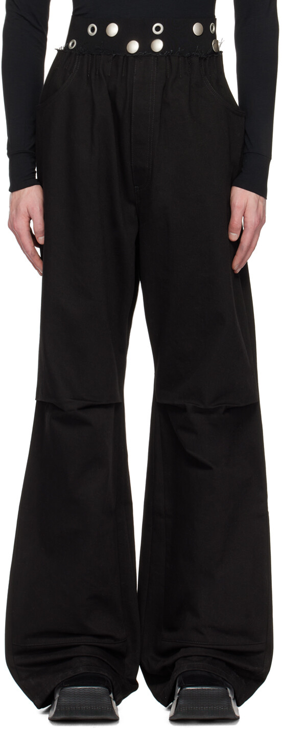 

Черные джинсы с люверсами Raf Simons