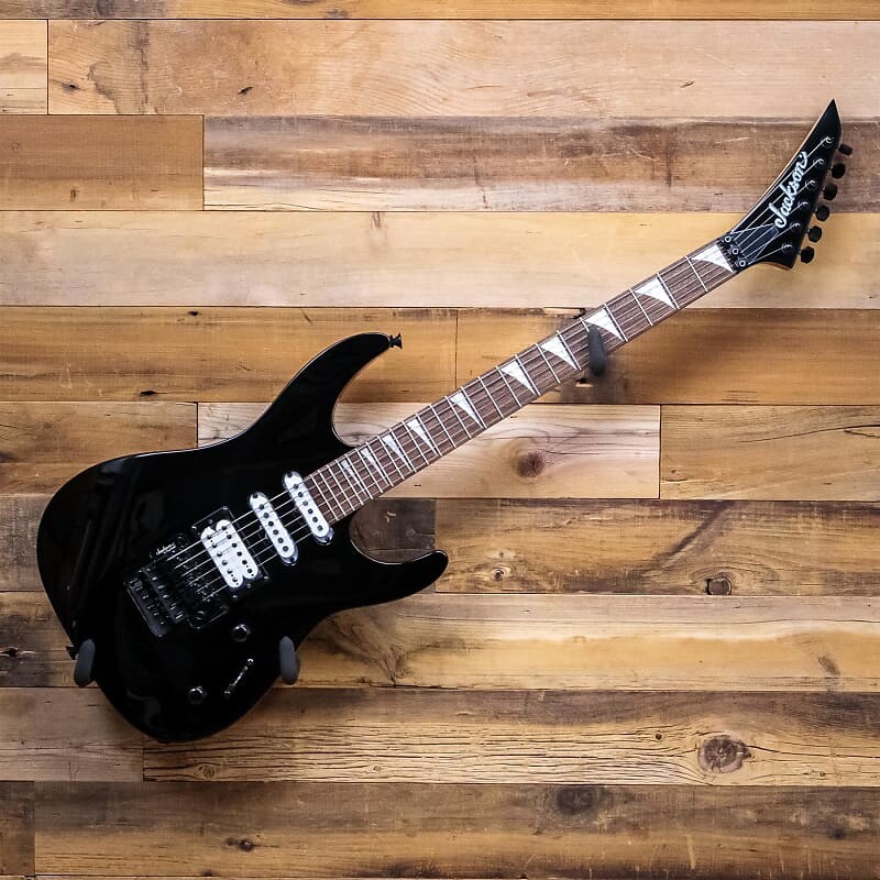 

Электрогитара Jackson X Series Dinky DK3XR HSS в глянцевом черном цвете X Series Dinky DK3XR HSS Electric Guitar in