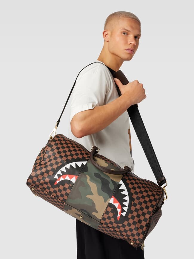 

Спортивная сумка с узором по всей поверхности, модель SIP With CAMO ACCENT Sprayground, коричневый