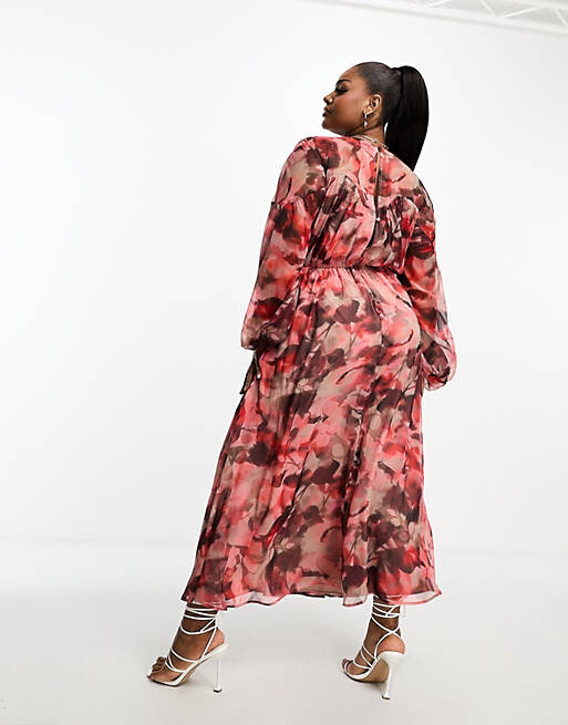 

Платье миди с длинными рукавами и завязкой на талии ASOS DESIGN Curve с размытым цветочным принтом