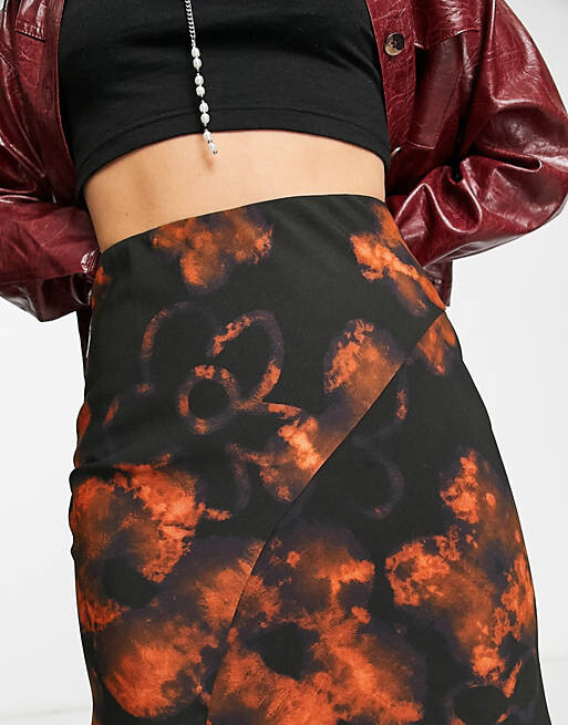 

Темная шифоновая юбка миди с размытым цветочным принтом ASOS DESIGN